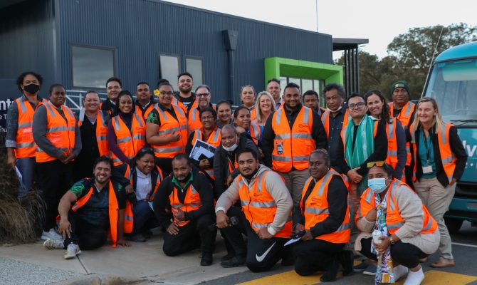 Study group touring waste management facilities 